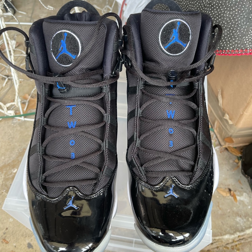 Jordan Men’s Black and Blue Patent Leather Sneakers